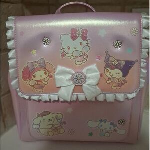 Her Universe Hello Kitty Pink Pearlescent White Ruffle Trim Mini Backpack NWT